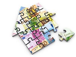 puzzle en forme de maison au design de billets de banque